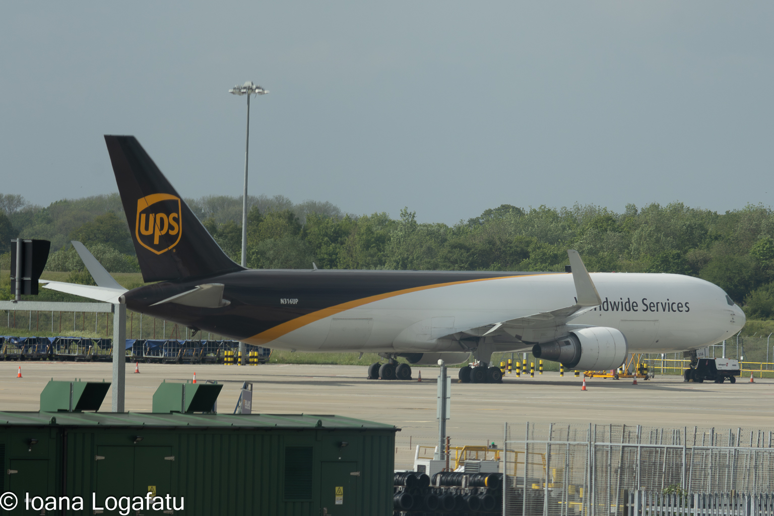 Cargo plane prepares for takeoff at busy airport